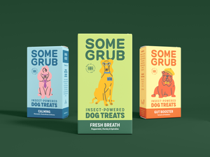 Some Grub Dog Treat Boxes on Green Background